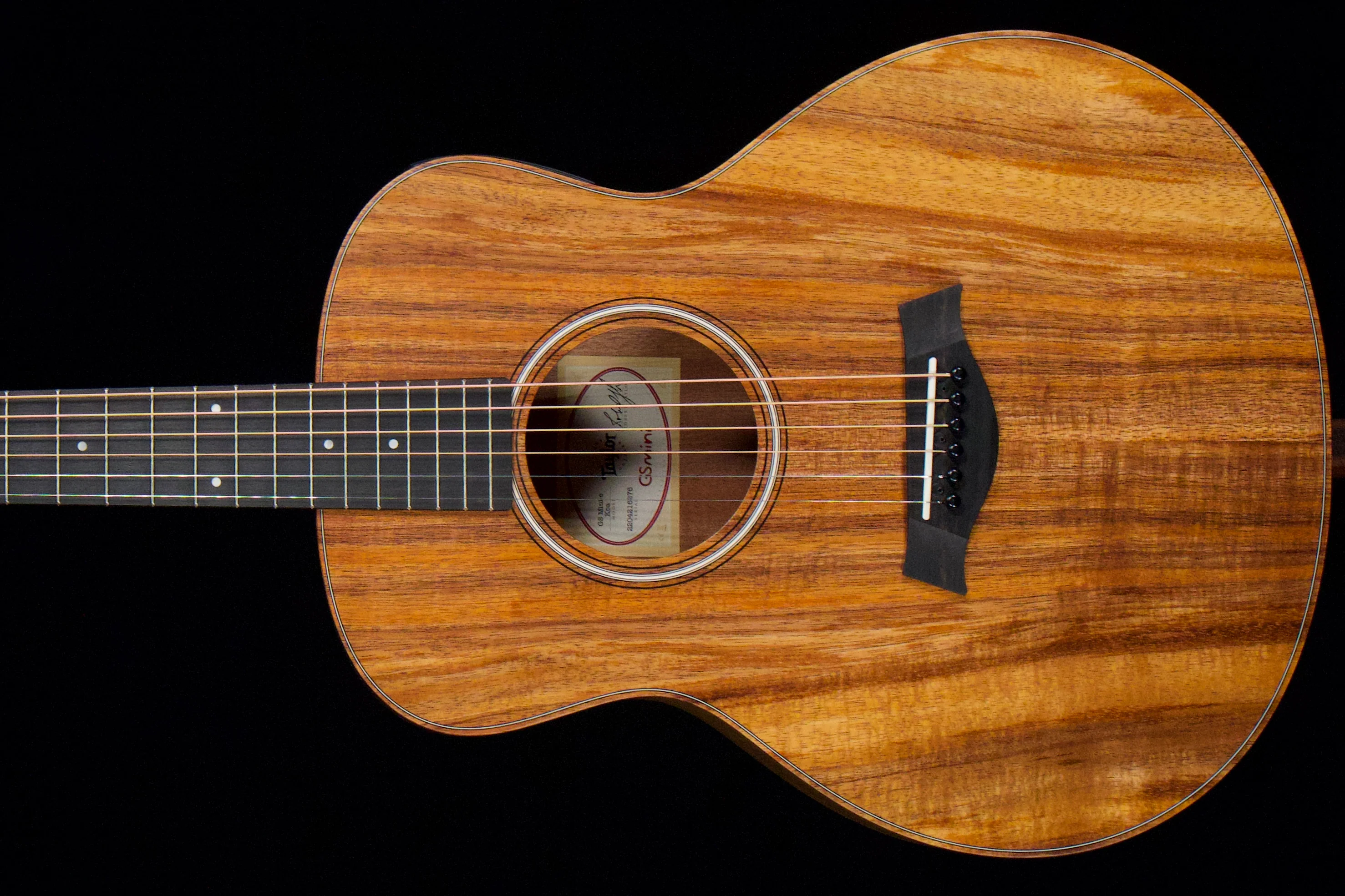 Taylor GS Mini-e Koa Guitar. Left-Handed